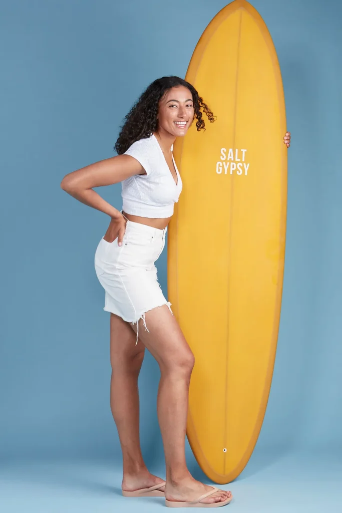 Archies Thongs product fashion photo in studio with surfboard