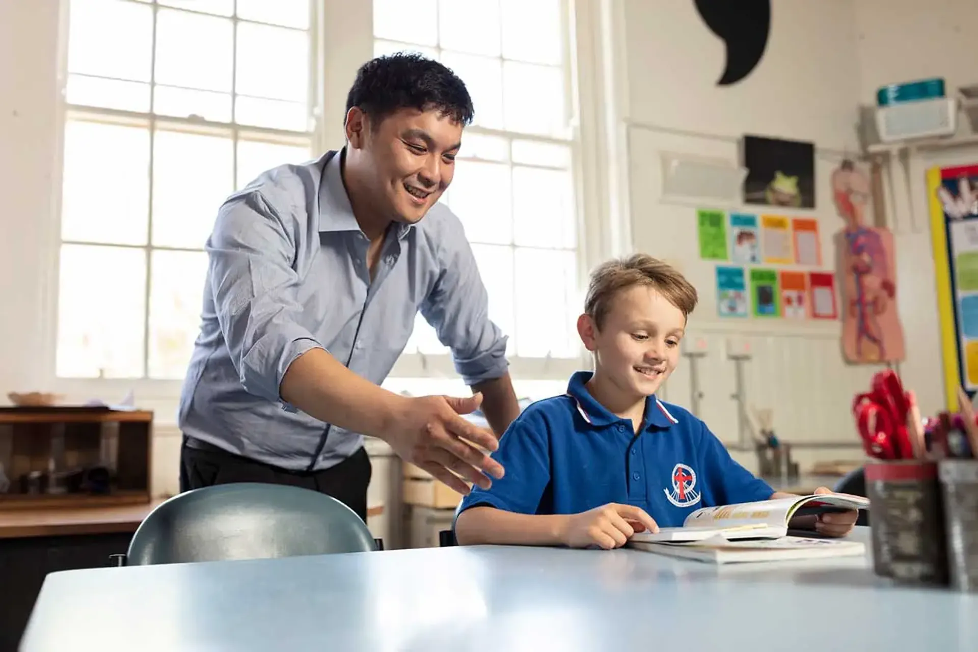 AFL Aus Kick in a Ballarat school teacher and child campaign photography.